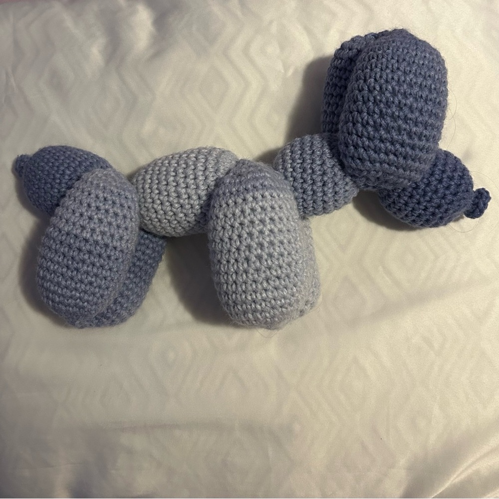 Homemade purple gradient crochet balloon dog. 14 inches long.